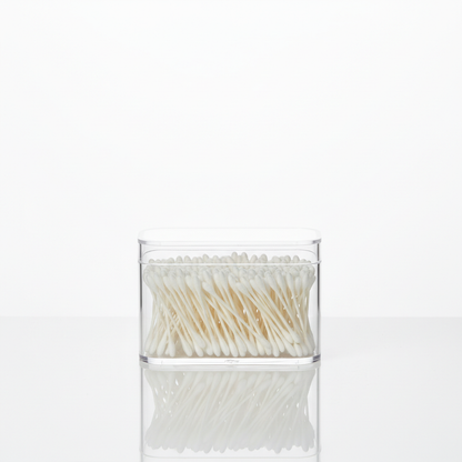 Clear acrylic 2-grid qtips storage organizer with hinged lid on a bathroom vanity